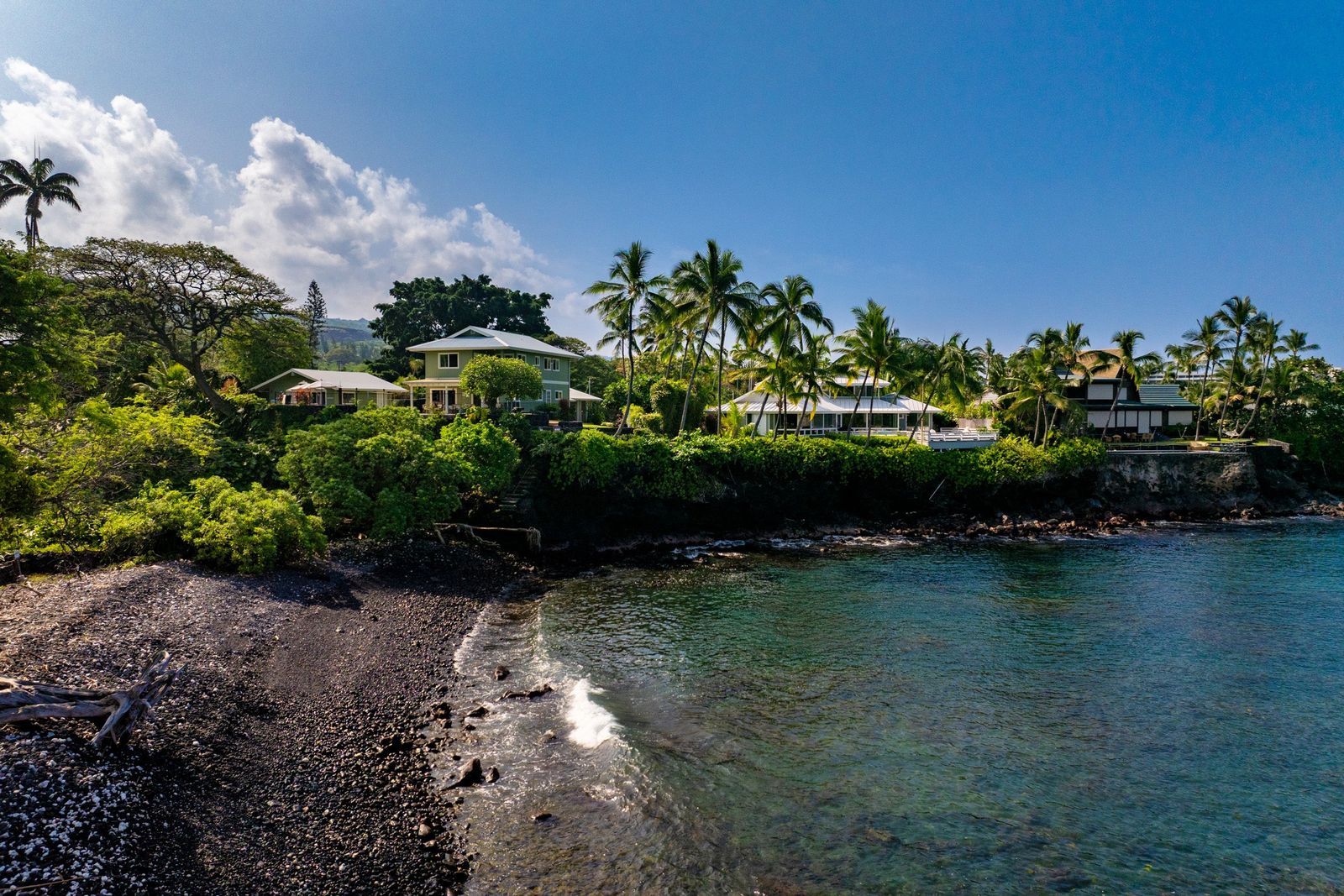 An oceanfront home on a protected bay along the Kona coast