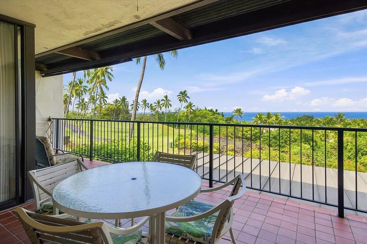 A Kailua-Kona condominium building, representing the softer North Kona condo segment in August 2026